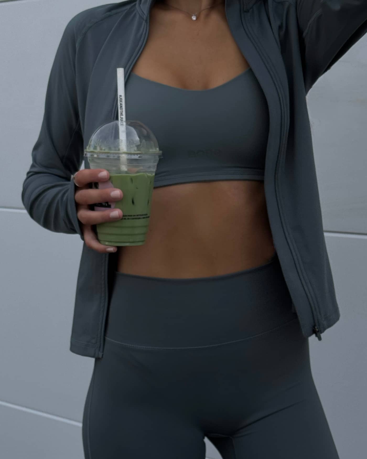 Front view of a model wearing the Björn Borg Studio Soft Padded Bra in Balsam Green (Green) with a tonal logo for training. - Image 8
