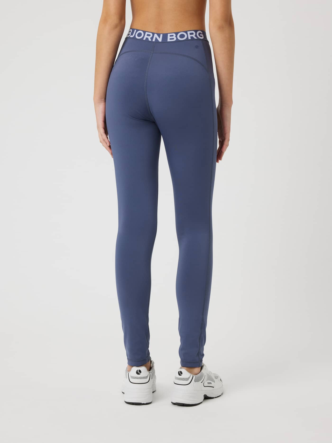 Back view of kids Borg Leggings in Nightshadow Blue (Blue) for training, featuring a white logo waistband. - Image 2