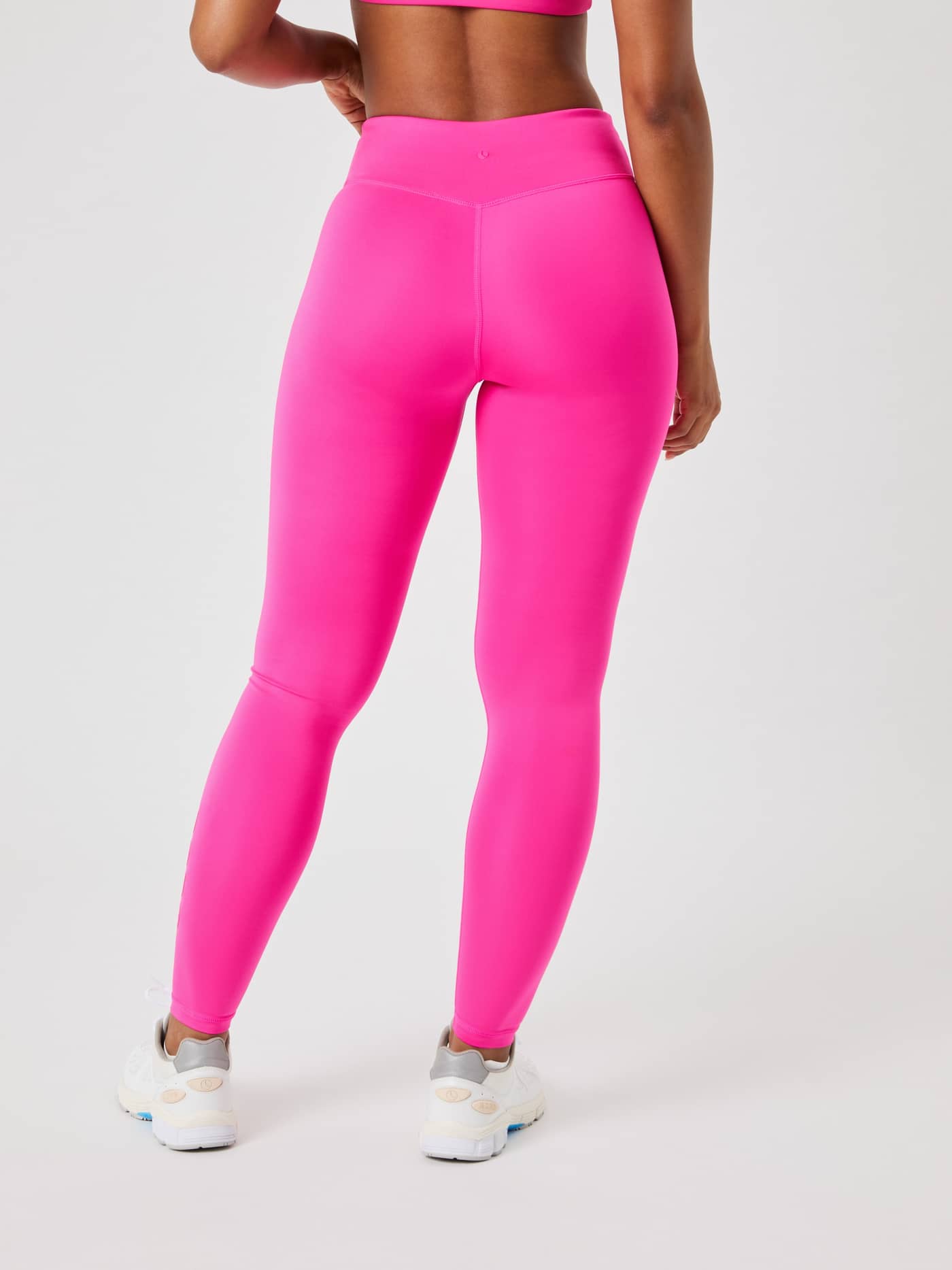 Back view of a model wearing soft, high waist Borg Logo Tights in Pink Glo (Pink) featuring a supportive training fit. - Image 2