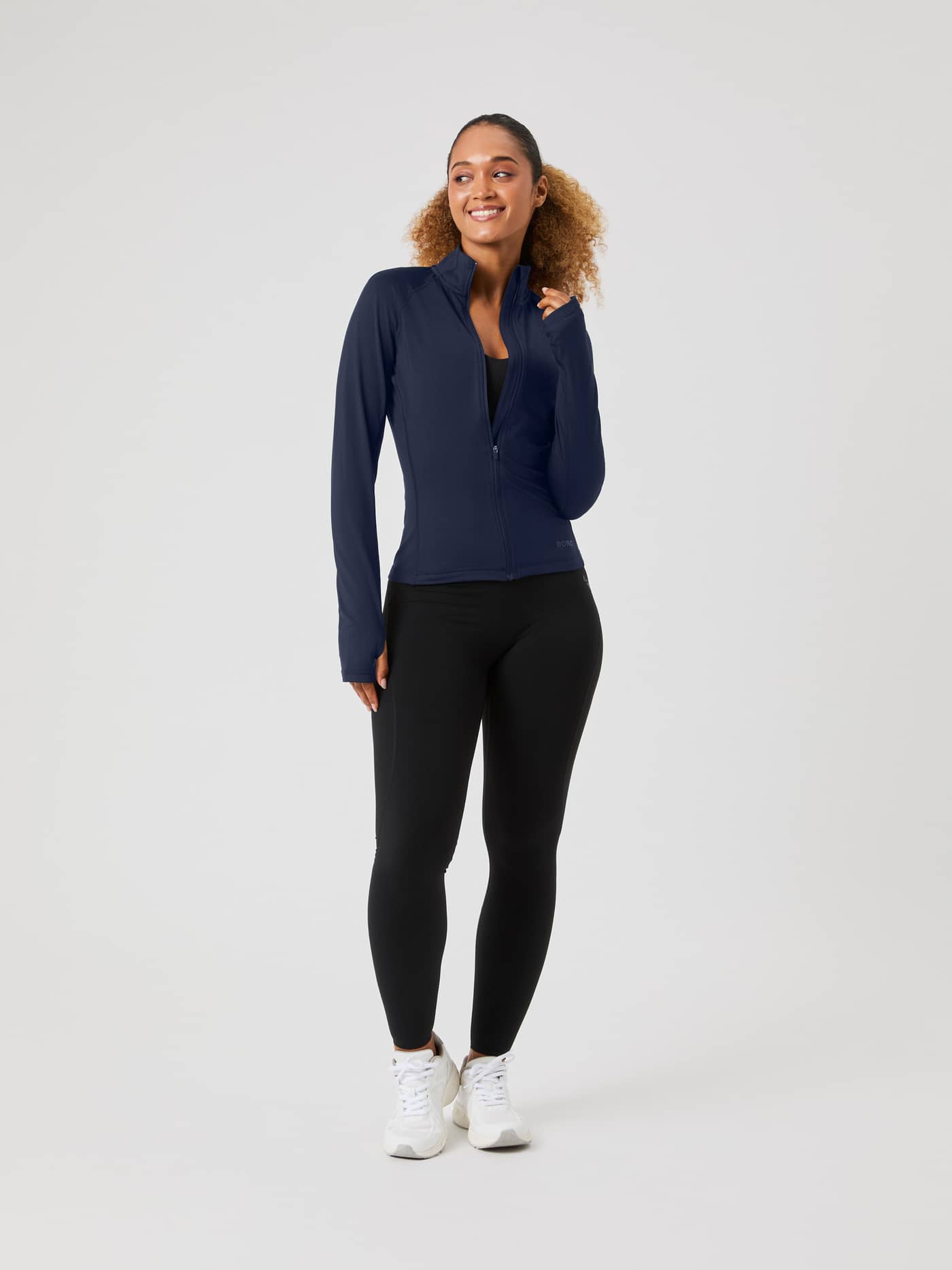 Full-body front view of a model in the Night sky (Navy) Borg Full Zip Midlayer, highlighting its performance training fit. - Image 3