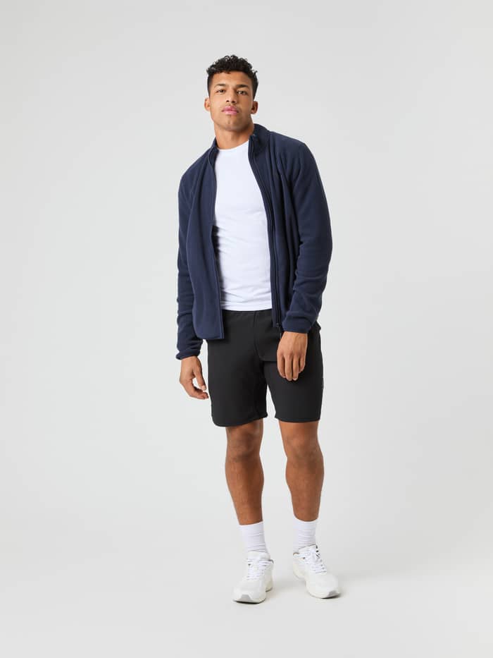 Vooraanzicht van een man in de Björn Borg Full Zip Fleece in Night sky (Marineblauw) voor een functionele stijl.