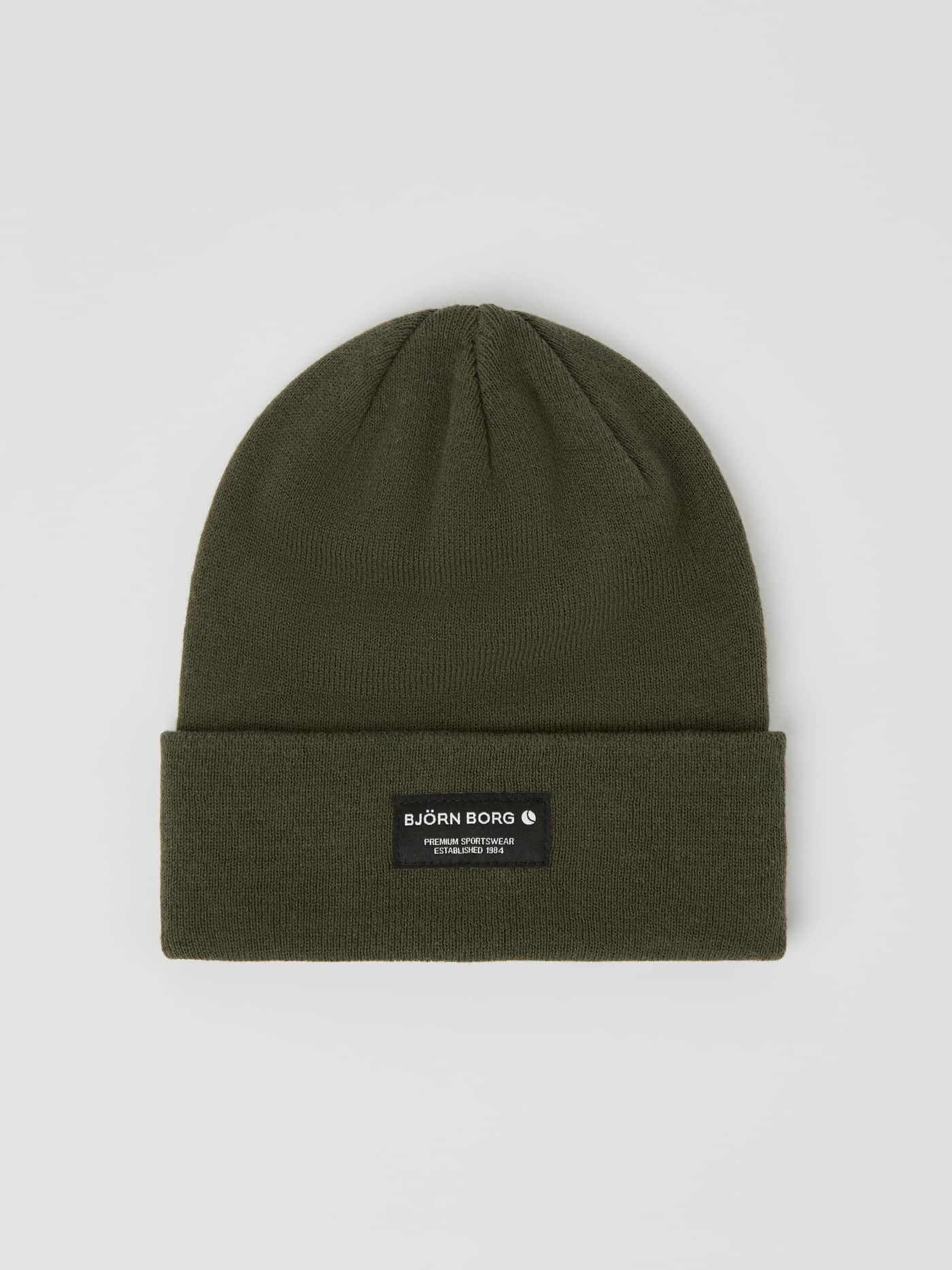 Centre Beanie i Forest Night (Grön) i ekologisk bomull med en uppvikt kant och logotypetikett på framsidan. - Image 1