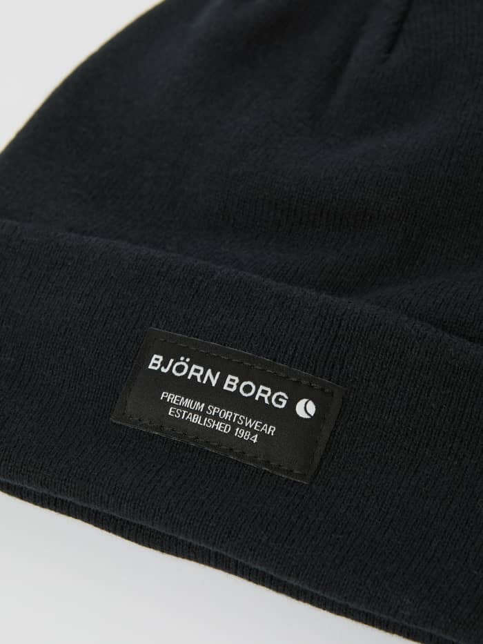 Close-up of the Björn Borg Centre Beanie in Black Beauty (Black), highlighting the organic cotton knit and front label. - Image 2
