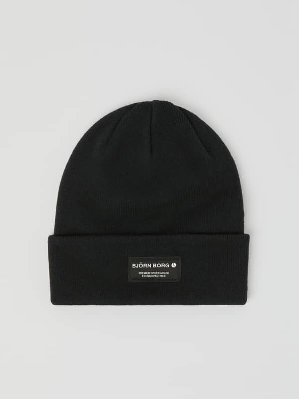 Front view of the organic cotton Björn Borg Centre Beanie in Black Beauty (Black) with a fold-up edge and logo label.