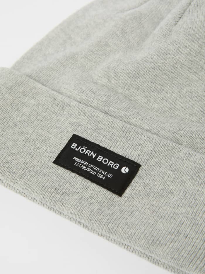 Detailed close-up of the Björn Borg Centre Beanie in Light Grey Melange (Grey), showcasing the organic cotton and logo label. - Image 2