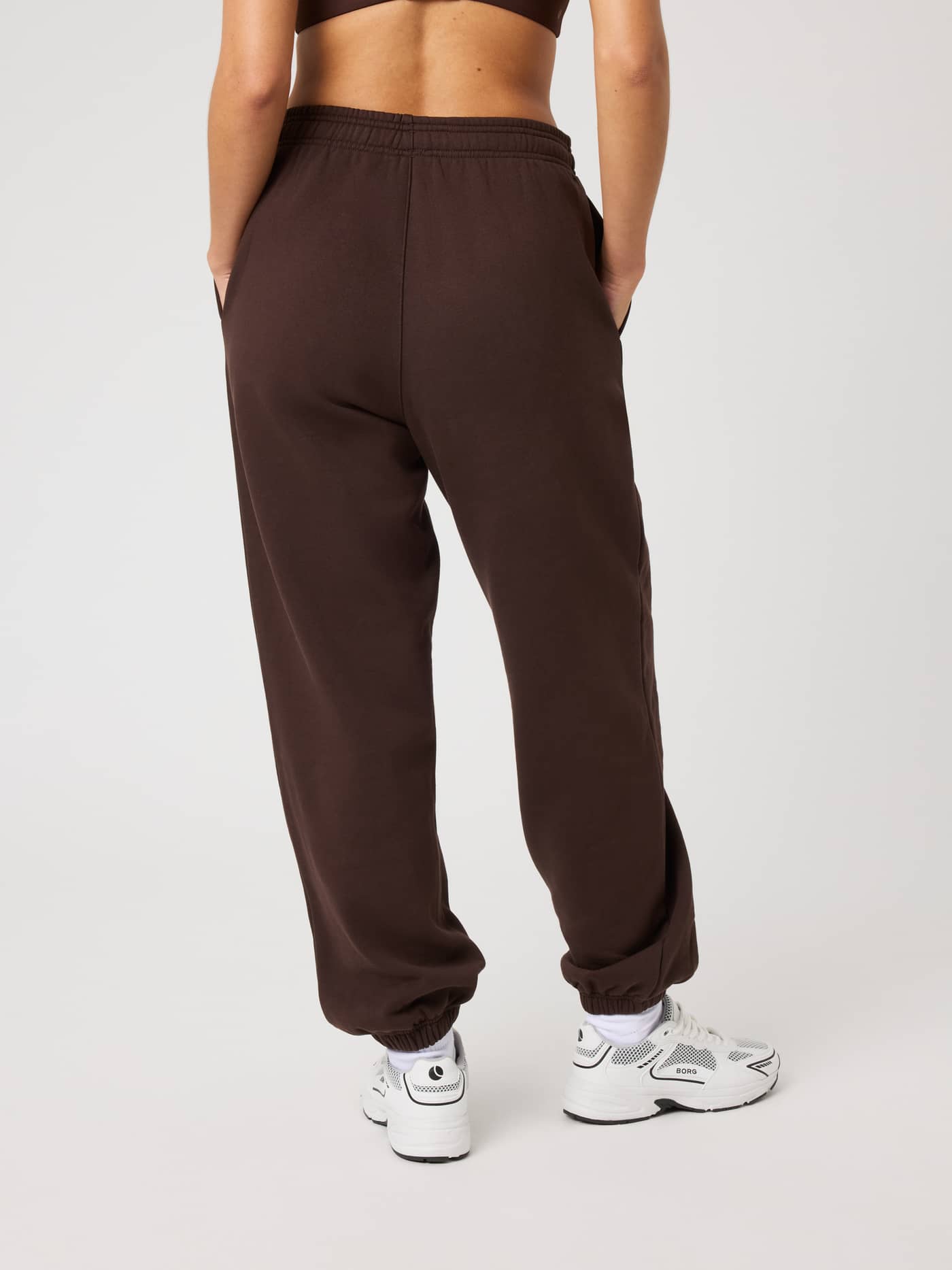 Studio Oversized Sweatpants in Coffee Bean (Brown) shown from behind, featuring a relaxed fit and high-waisted design. - Image 3