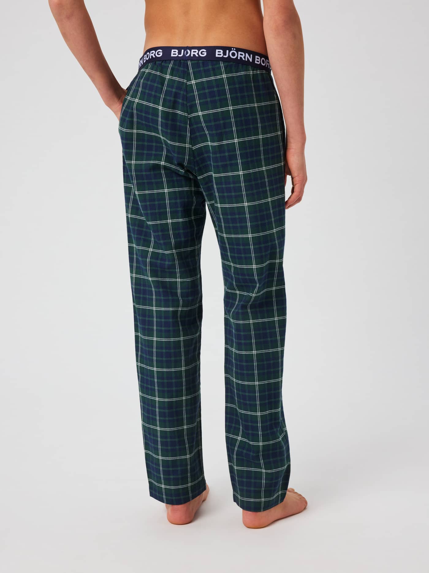Back view of the Core Pyjama Pants with a green and navy tartan pattern, soft waistband, and white Björn Borg logo. - Image 3