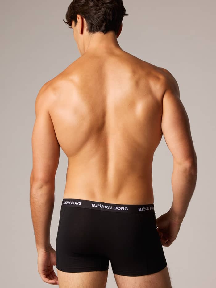 Zwarte Cotton Stretch Trunks 5-pack met witte logo-tailleband voor een stijlvolle en perfecte pasvorm, achteraanzicht. - Image 2