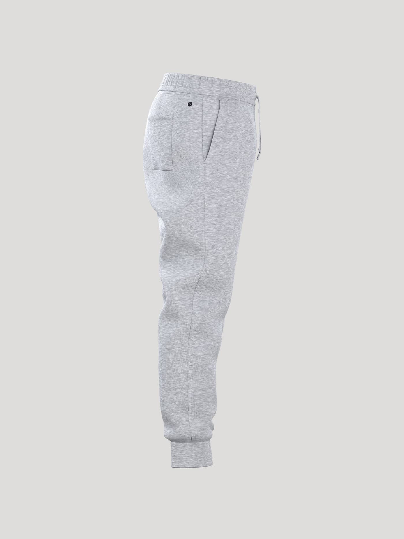 Studio shot of the Borg Essential 1 Sweatpants in light grey melange, seen from the side. - Image 2
