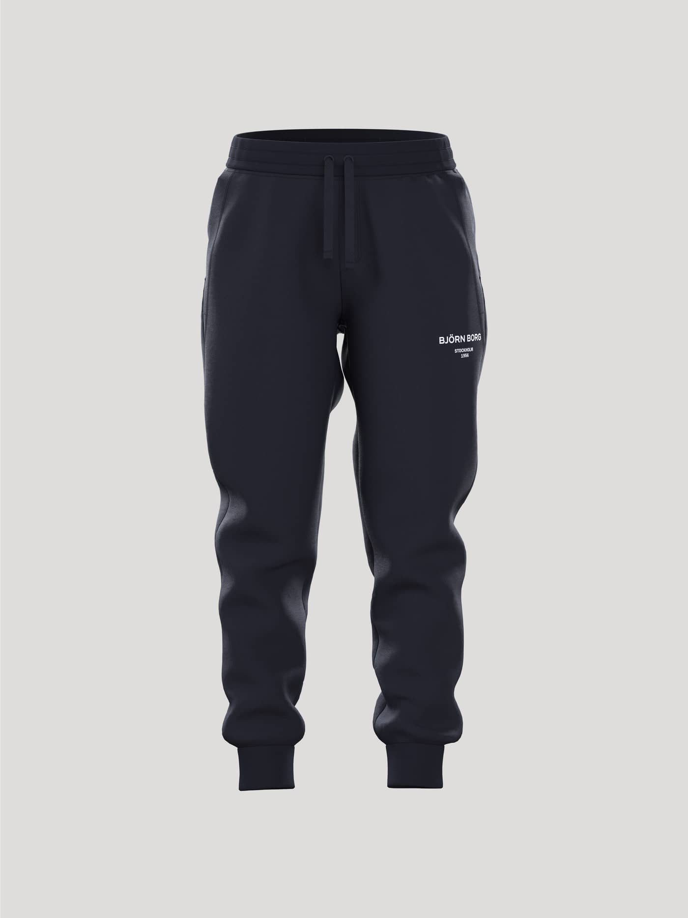 Vorderansicht der Borg Essential 1 Sweatpants für Kinder in Night sky (Marineblau) mit weißem Logo und Tapered Fit. - Image 1