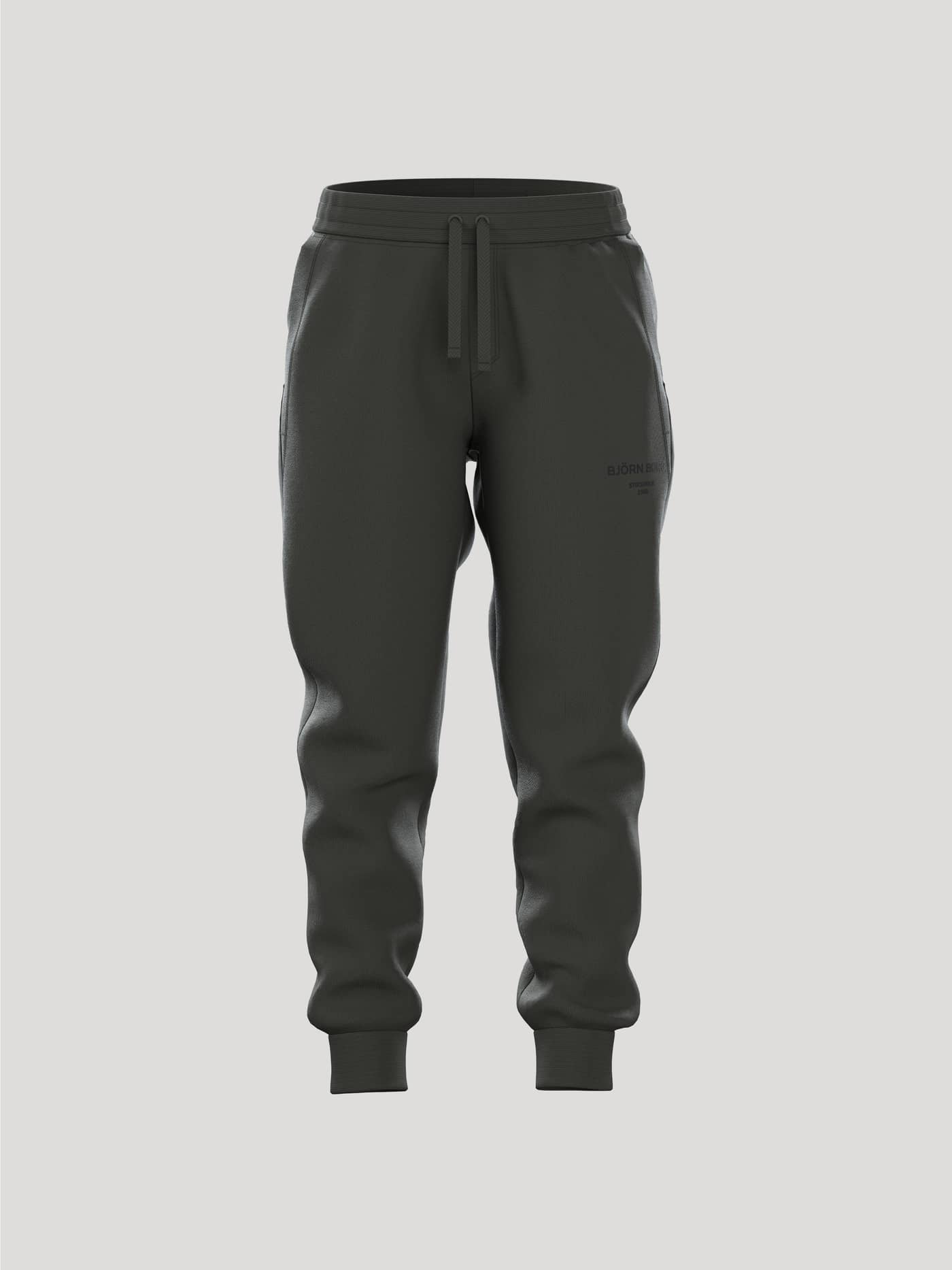 Borg Essential 1 Sweatpants för barn sedda framifrån i färgen Peat (Grön), perfekta för en bekväm fritidsstil. - Image 1