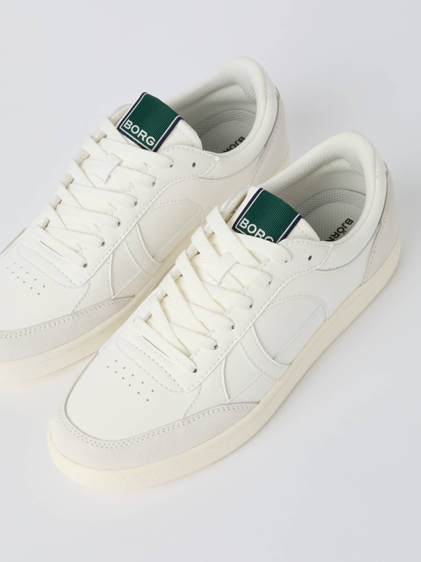 White Men's Court Sneakers featuring a tennis-inspired style and durable synthetic leather with a green tongue logo. - Image 2