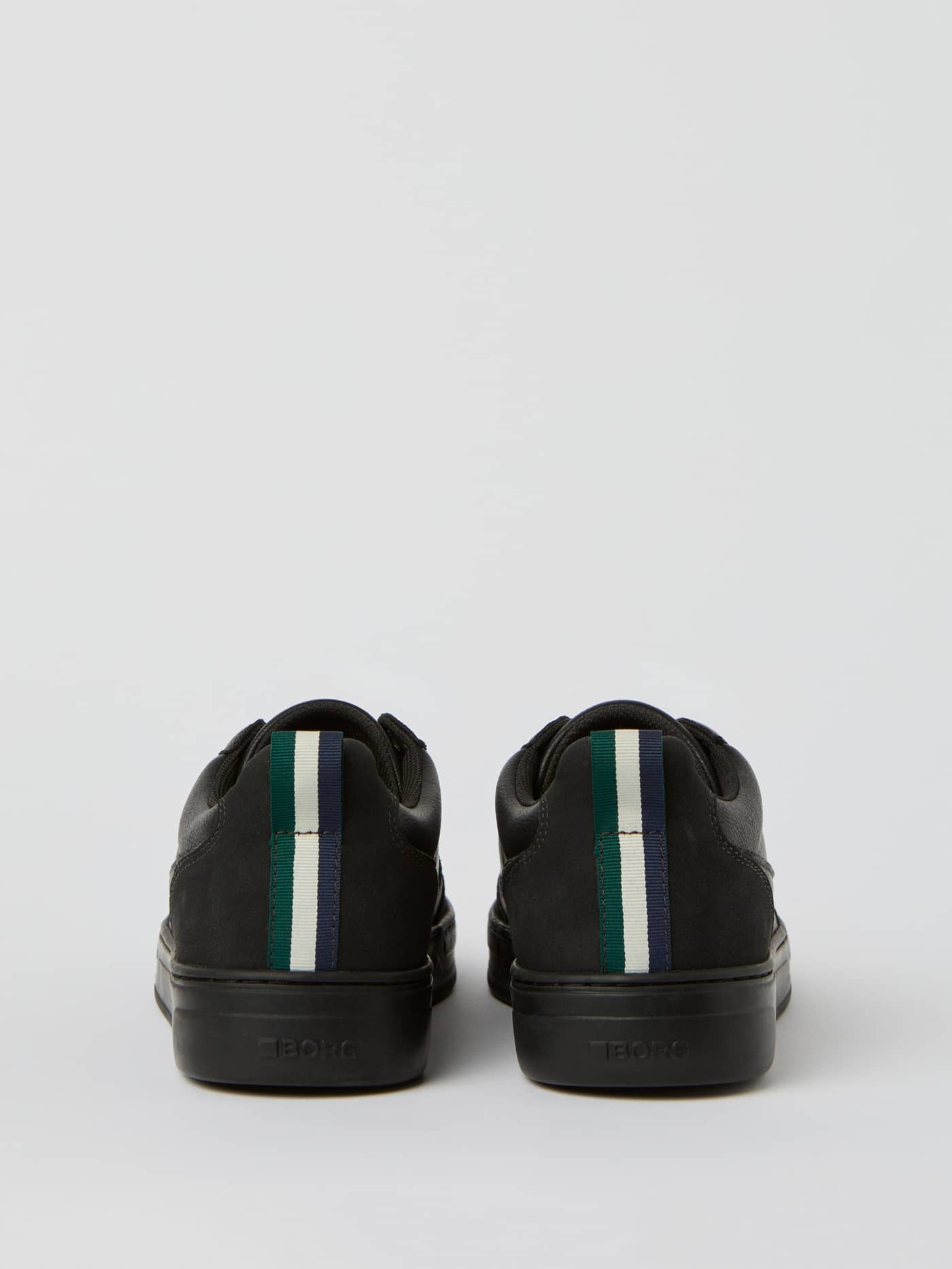 Back view of the black Men's Game Low Sneakers for tennis and leisure, featuring striped heel tape and a black BORG logo. - Image 3