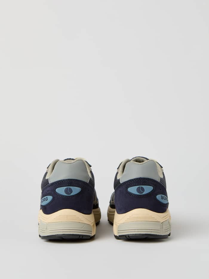 Achteraanzicht van de marineblauwe Men's Prime Court Sneakers met rundsuède details voor een functionele running-stijl. - Image 3