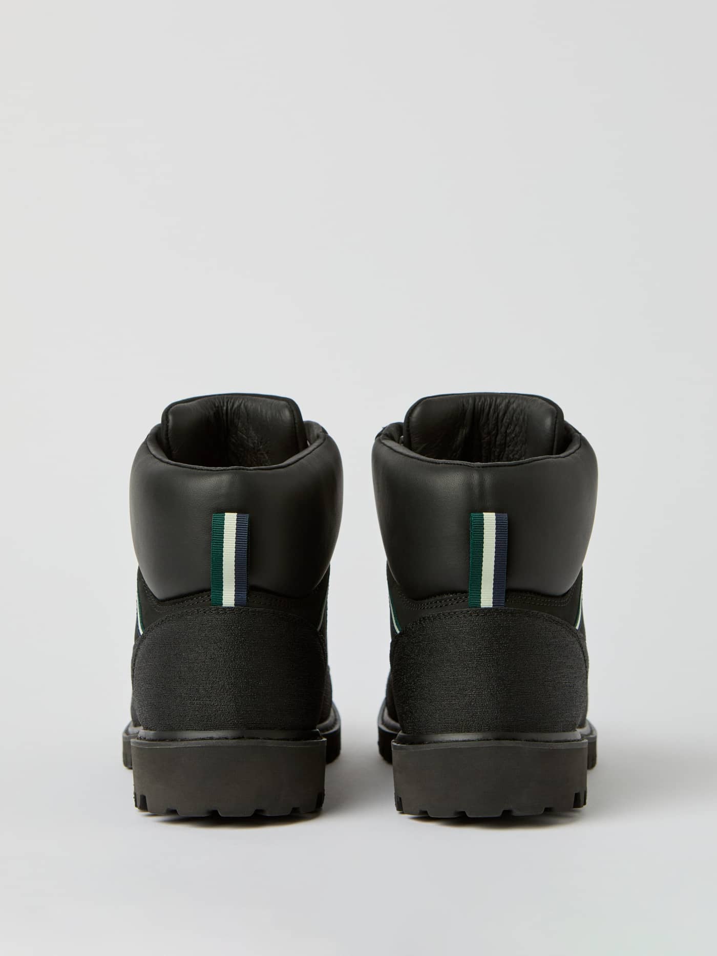 Back view of the black leather Men's Venture Boots, featuring striped pull tabs and a functional, stylish leisure fit. - Image 4