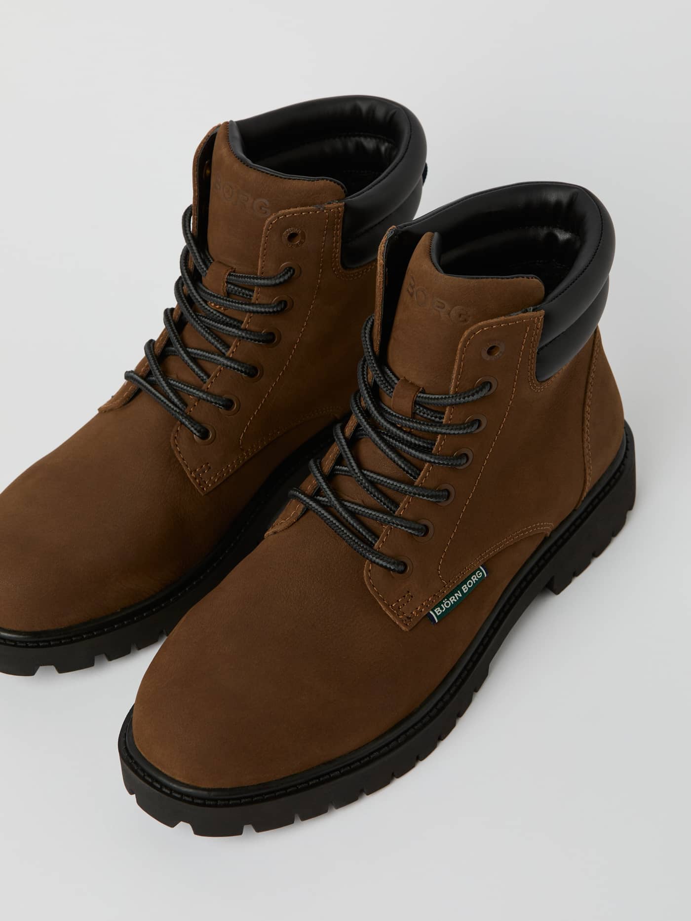 Front view of the Men's Ridge Boots in Brown, crafted from premium cow leather for a functional and stylish leisure look. - Image 2