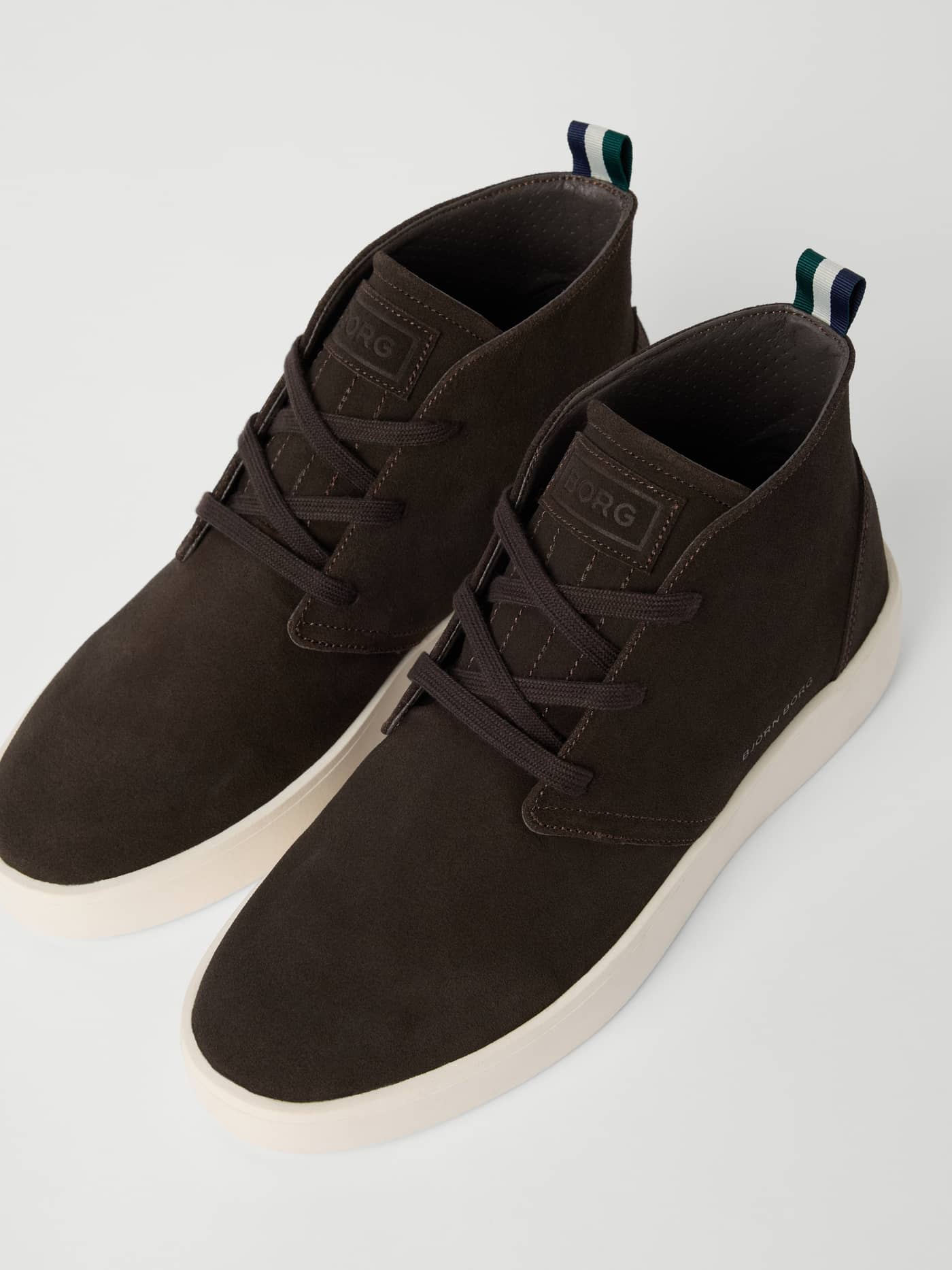 Three-quarter view of the brown suede Björn Borg Men's Desert Chukka Sneakers with a tennis-inspired style and white soles. - Image 2