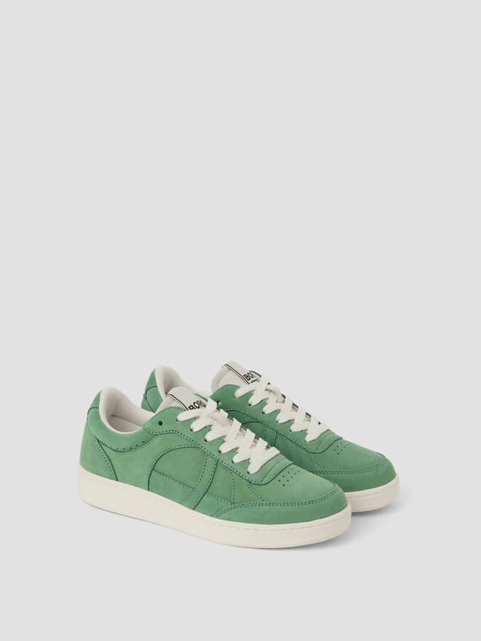 Women's Court Suede Sneakers in green, crafted from pig suede leather with white soles for a classic tennis style.