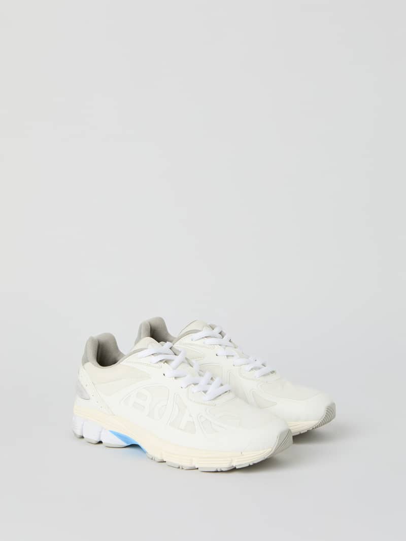 White Women's Prime Tech Sneakers featuring a lightweight and durable design for training and modern leisure style.