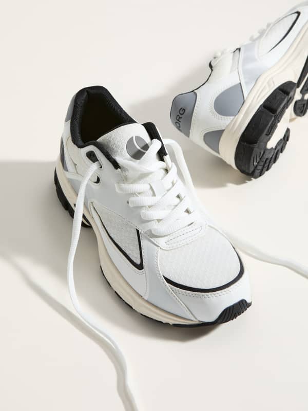 White Women's Nova Sneakers with a grey logo, featuring a TPU and polyester design for running style and a supportive fit.