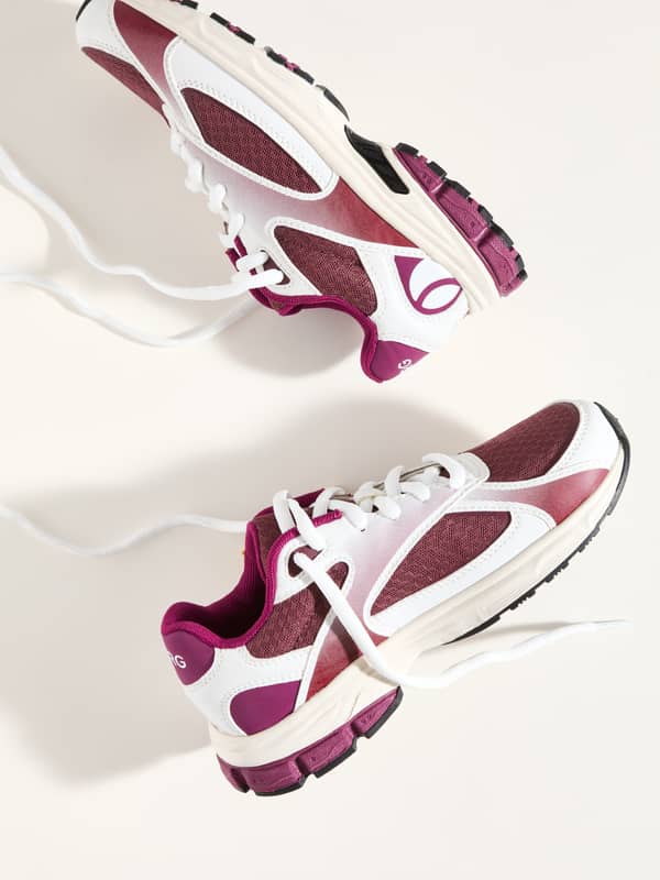 Top view of the Women's Nova Sneakers in white and red, featuring a white logo and a stylish fit for running.