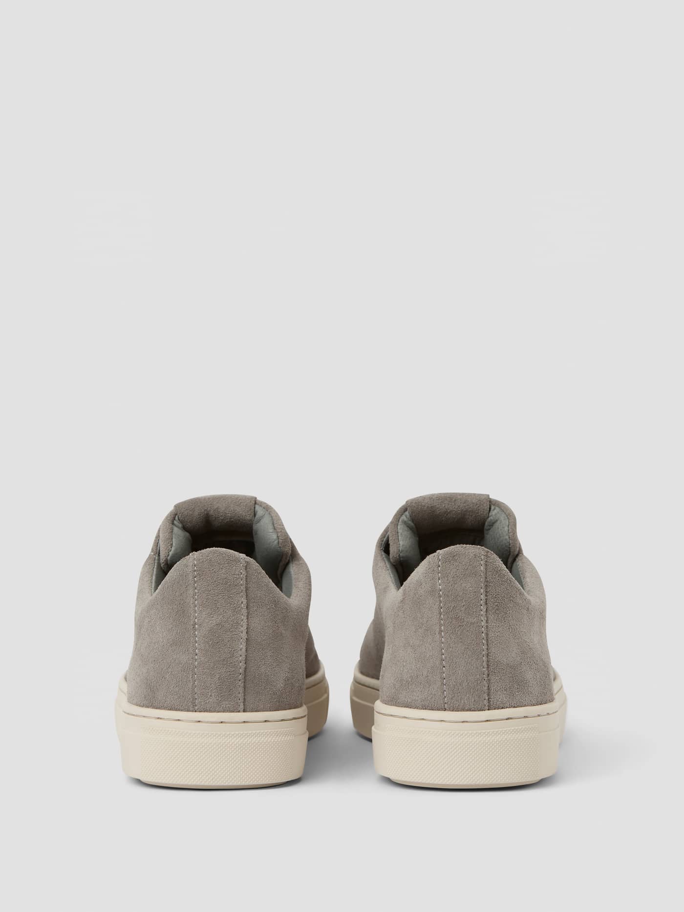 Grey Men's Classic Suede Sneakers viewed from the back, highlighting the premium suede and a functional leisure fit. - Image 2