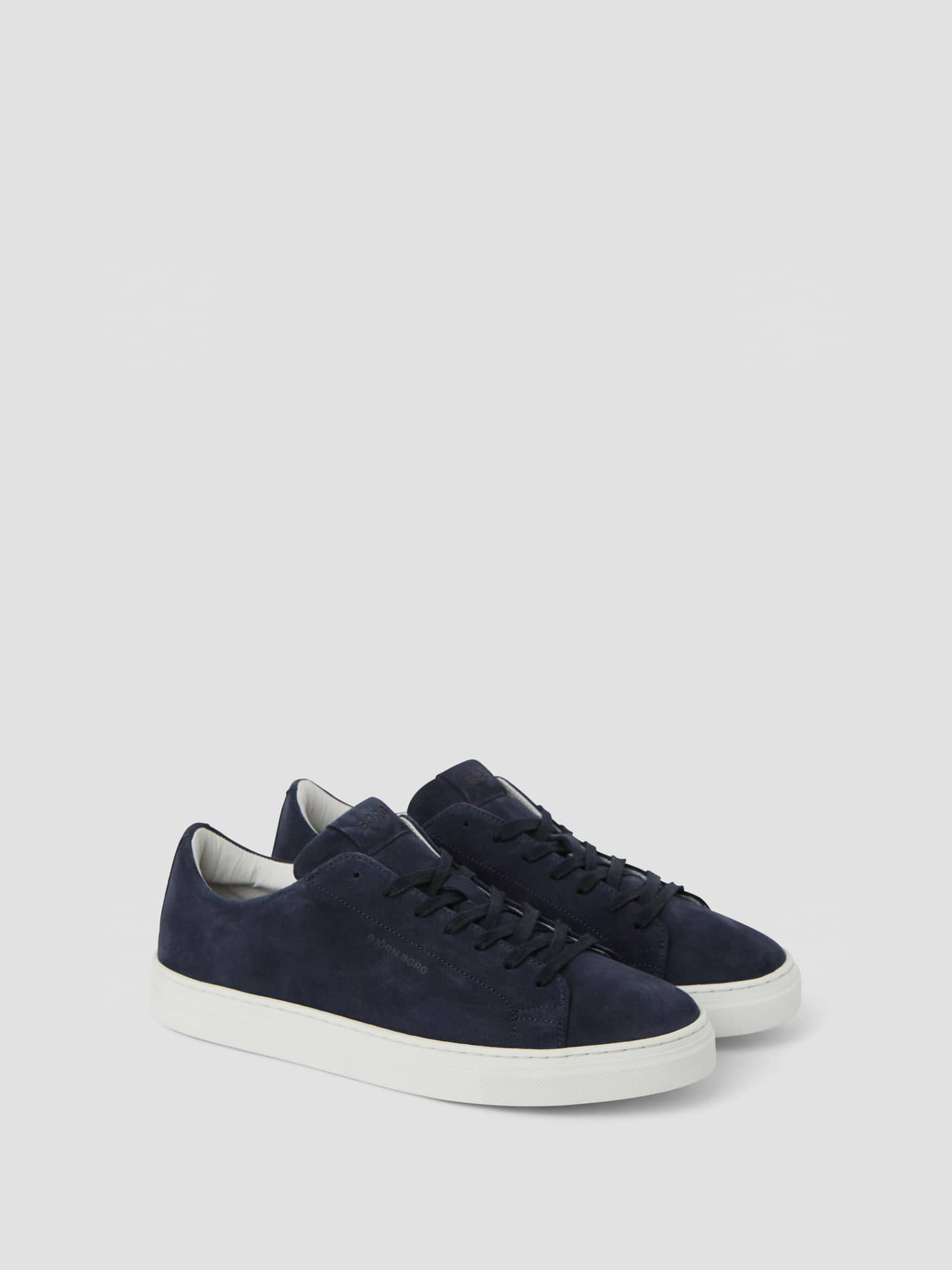 Navy Men's Classic Suede Sneakers in premium suede with a white sole and navy logo, offering style and function for tennis. - Image 1