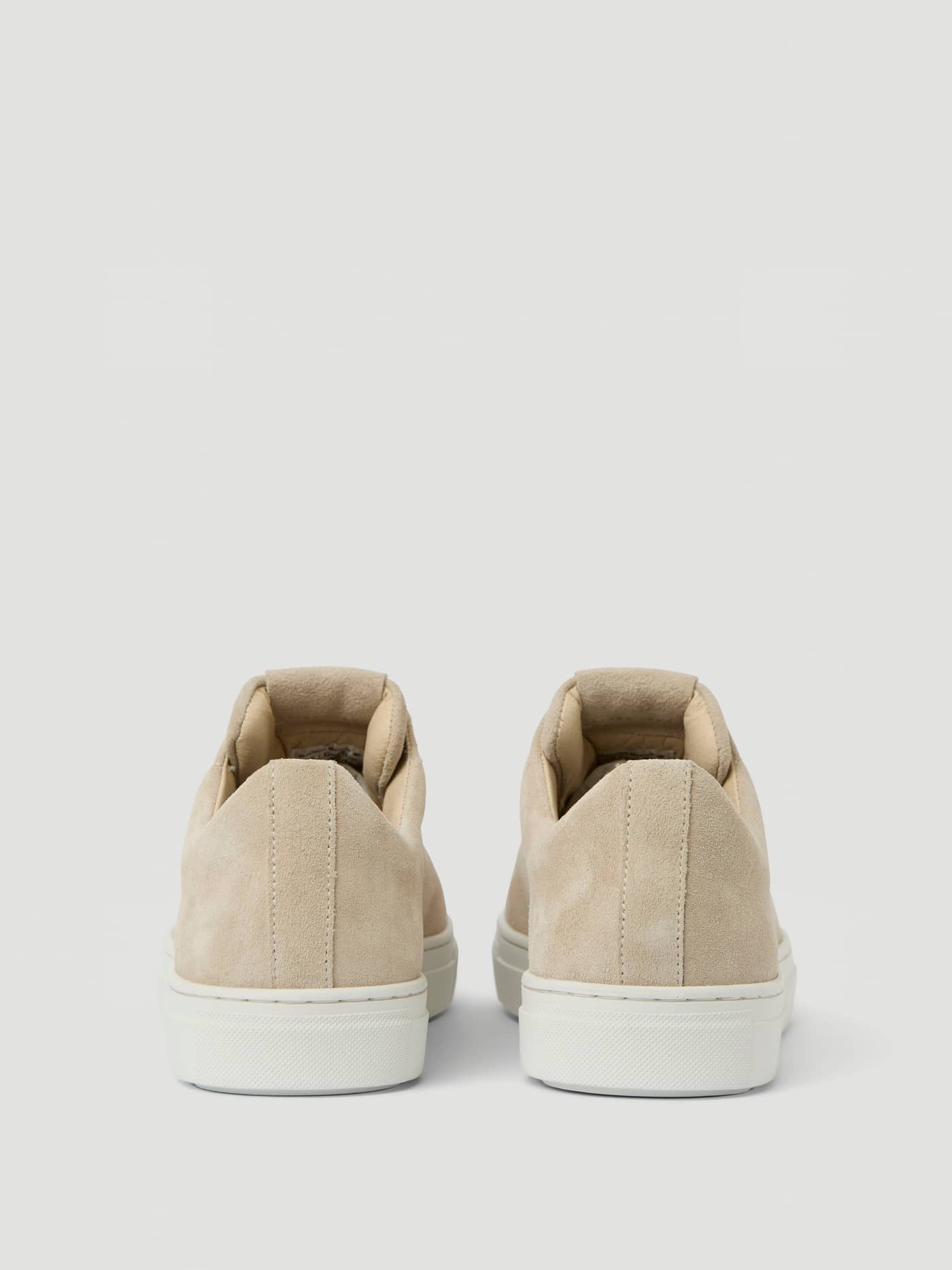 Back view of the Men's Classic Suede Sneakers in Beige, featuring premium suede material for a stylish leisure fit. - Image 3