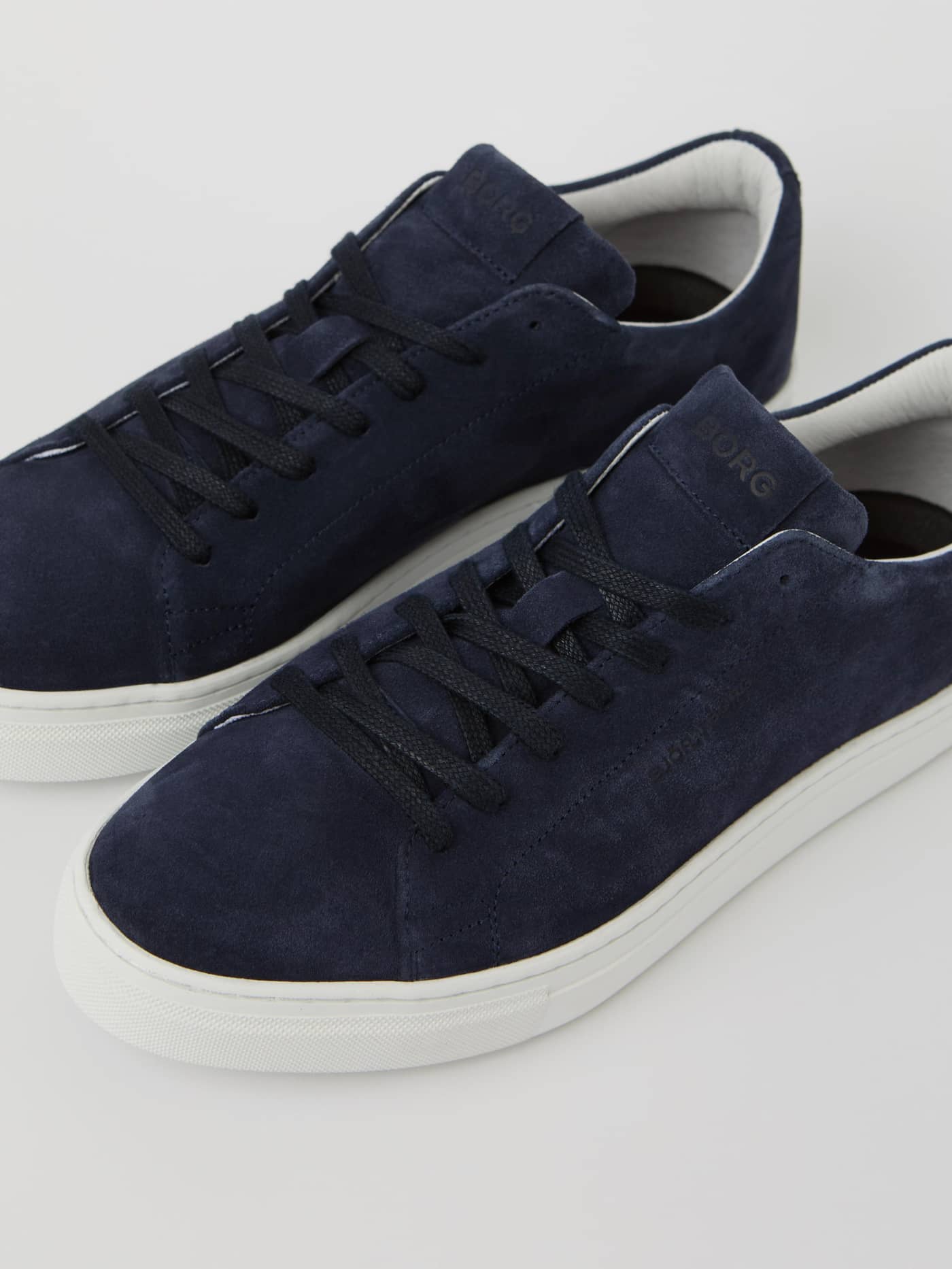 Men's Classic Suede Sneakers in Navy, featuring white soles and a premium finish for a stylish, durable leisure fit. - Image 2