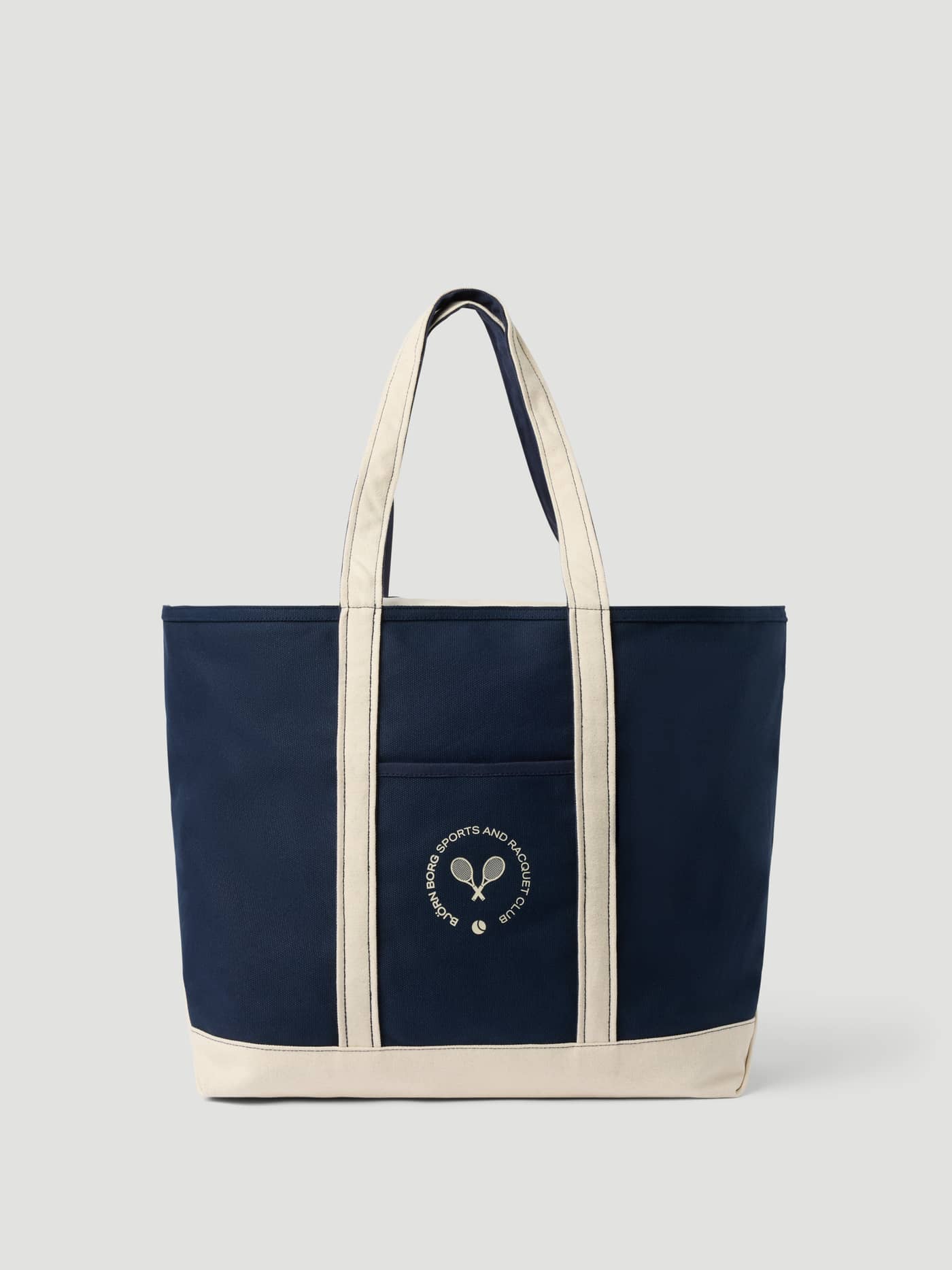 Ace Canvas Tote 30L in Night Sky (Marine) van katoen canvas met crème accenten en een tennislogo voor de tennisbaan. - Image 1