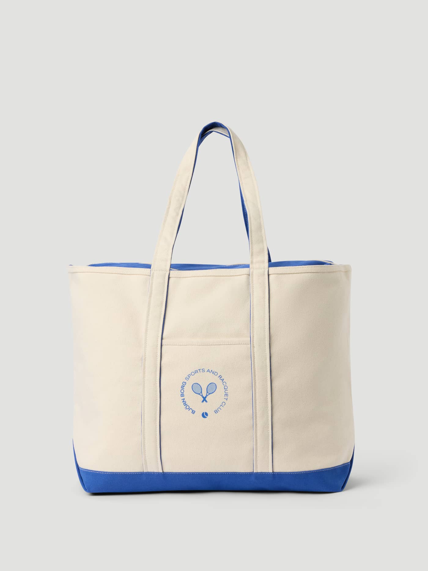 Ace Canvas Tote 30L in Egret (Wit) met een blauw tennislogo van stevig katoenen canvas voor tennis en padel. - Image 1