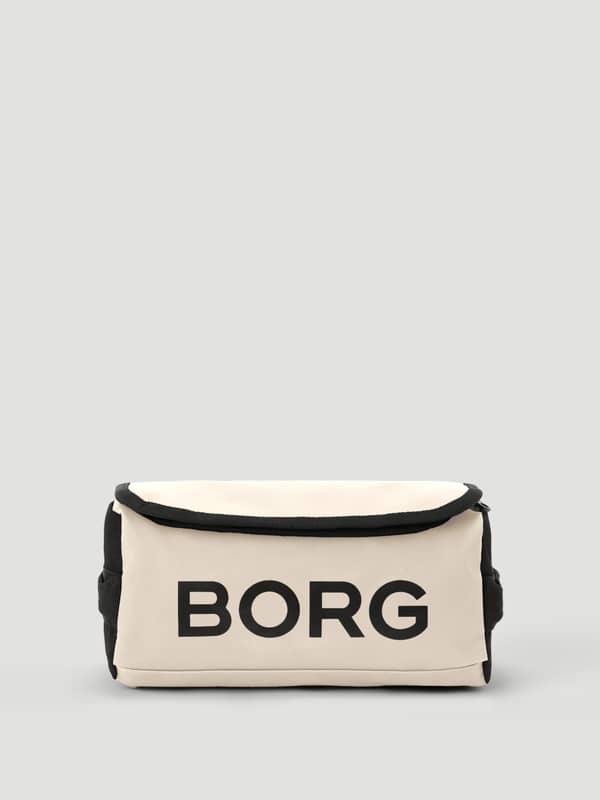 Travel Wash Bag i Bone White (Vit) sedd framifrån med en stor svart BORG-logotyp och kontrasterande svarta detaljer.