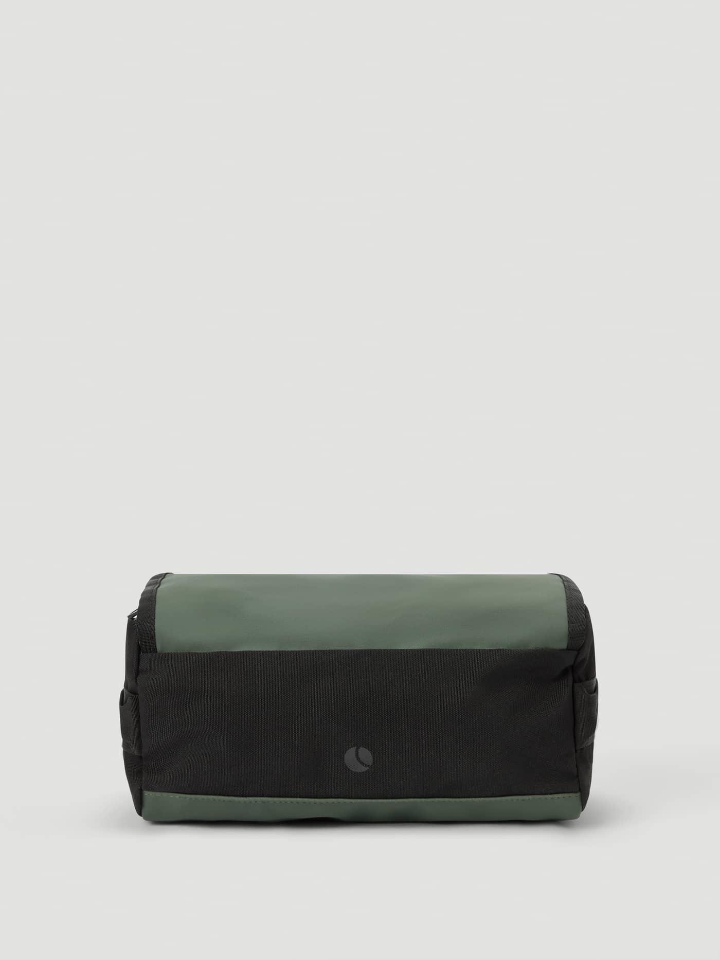 Front view of the Travel Wash Bag in Mountain View (Green) and black, featuring a tonal logo and durable recycled polyester. - Image 2