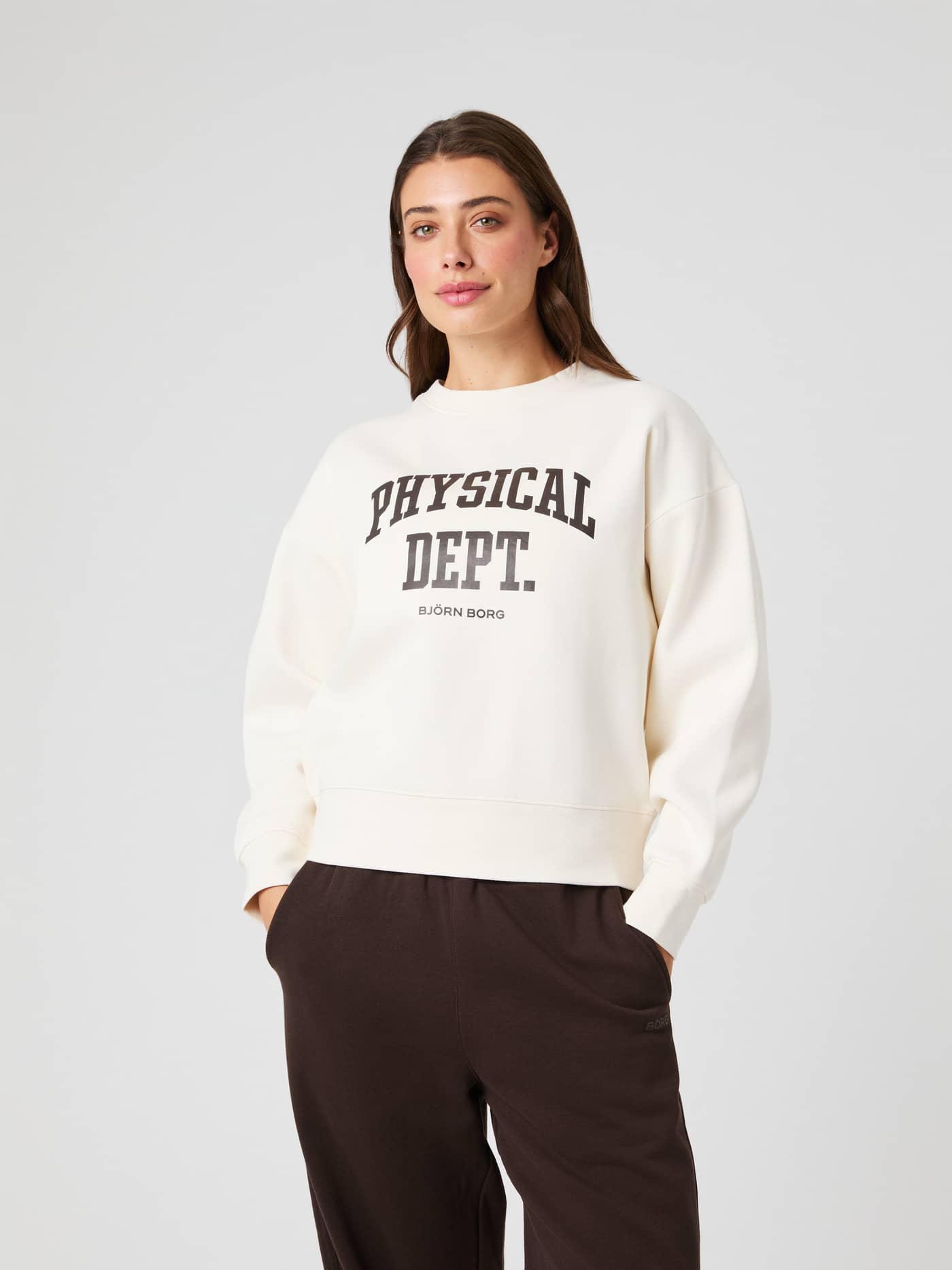 Front view of a woman in the Tofu (White) Borg Boyfriend Sweatshirt with a relaxed oversized fit and dropped shoulders. - Image 2