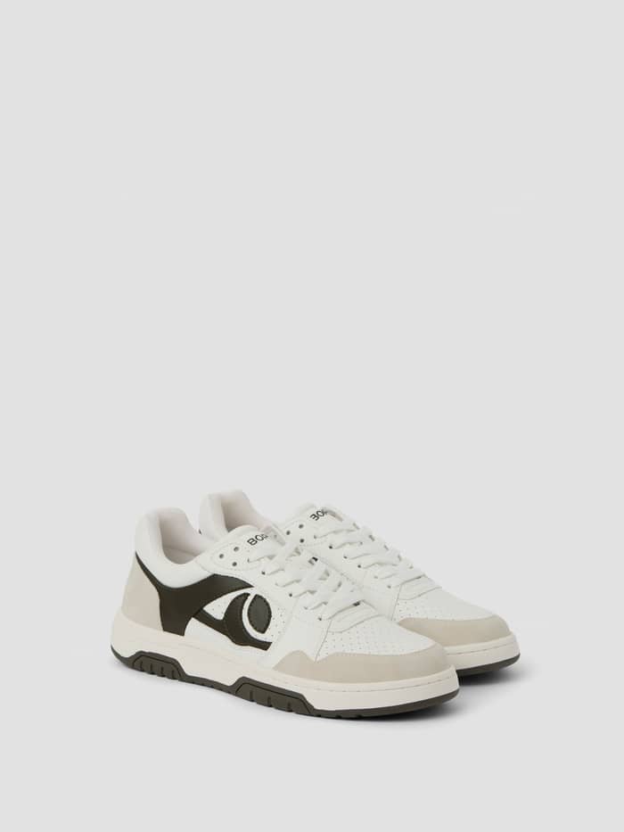 Angled view of white Men's Ollie WB Sneakers in cow suede leather and waterbased PU, with a tennis-inspired leisure style.