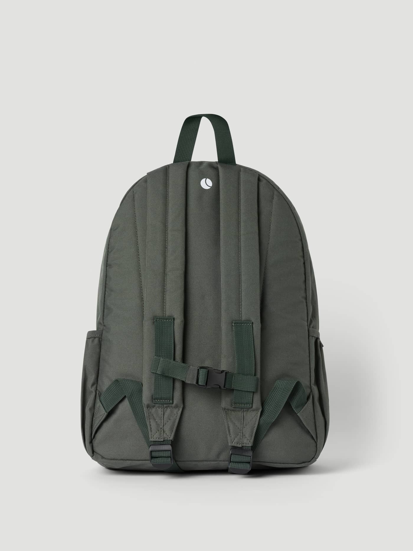Back view of the Thyme (Green) Borg Junior Backpack 15L for kids, highlighting the adjustable straps and chest buckle. - Image 2
