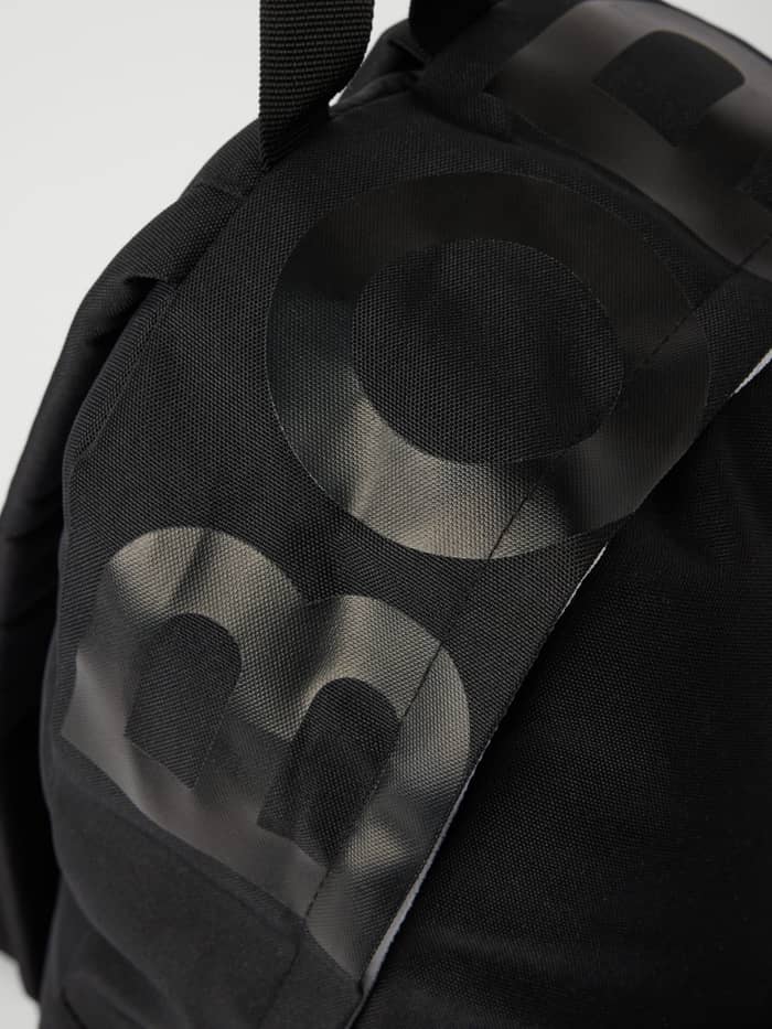 Detailed close-up of the Borg Logo Backpack 20L in Black Beauty (Black), a training bag with a large tonal logo. - Image 3