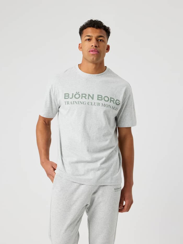 Borg Classic Print T-Shirt i Ultra Light Grey Melange (Grå) set forfra i 100% bomuld med et grønt logo til hverdag.