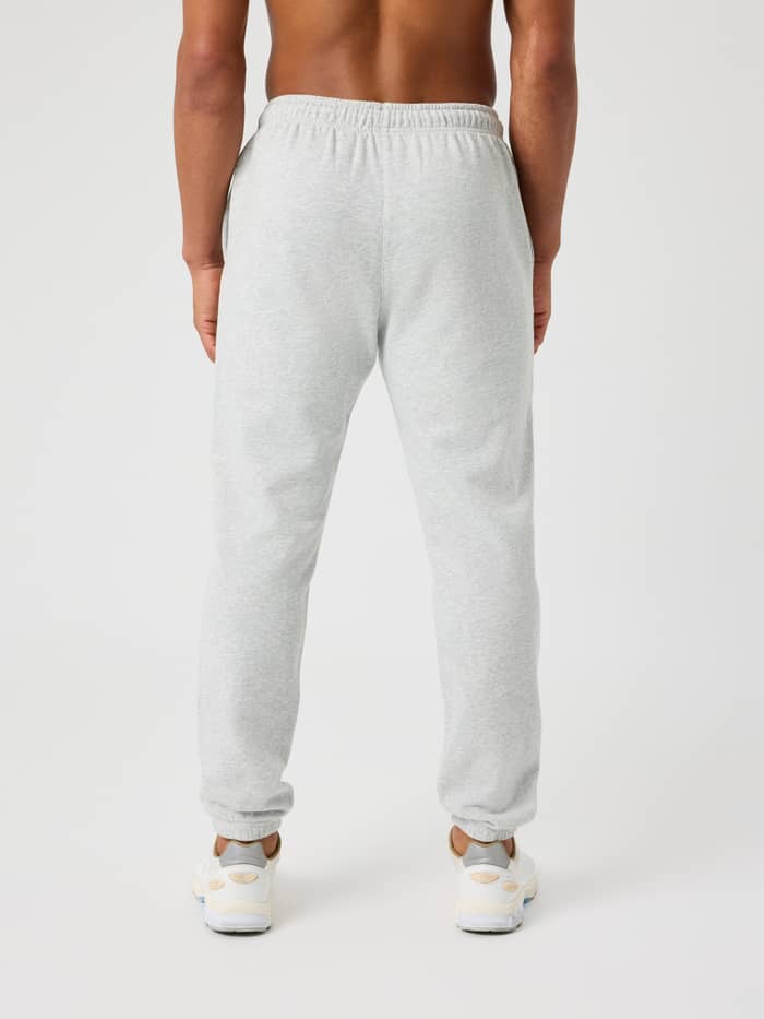 Back view of a man in cotton Björn Borg Classic Print Sweatpants in Ultra Light Grey Melange (Grey) with a regular fit.