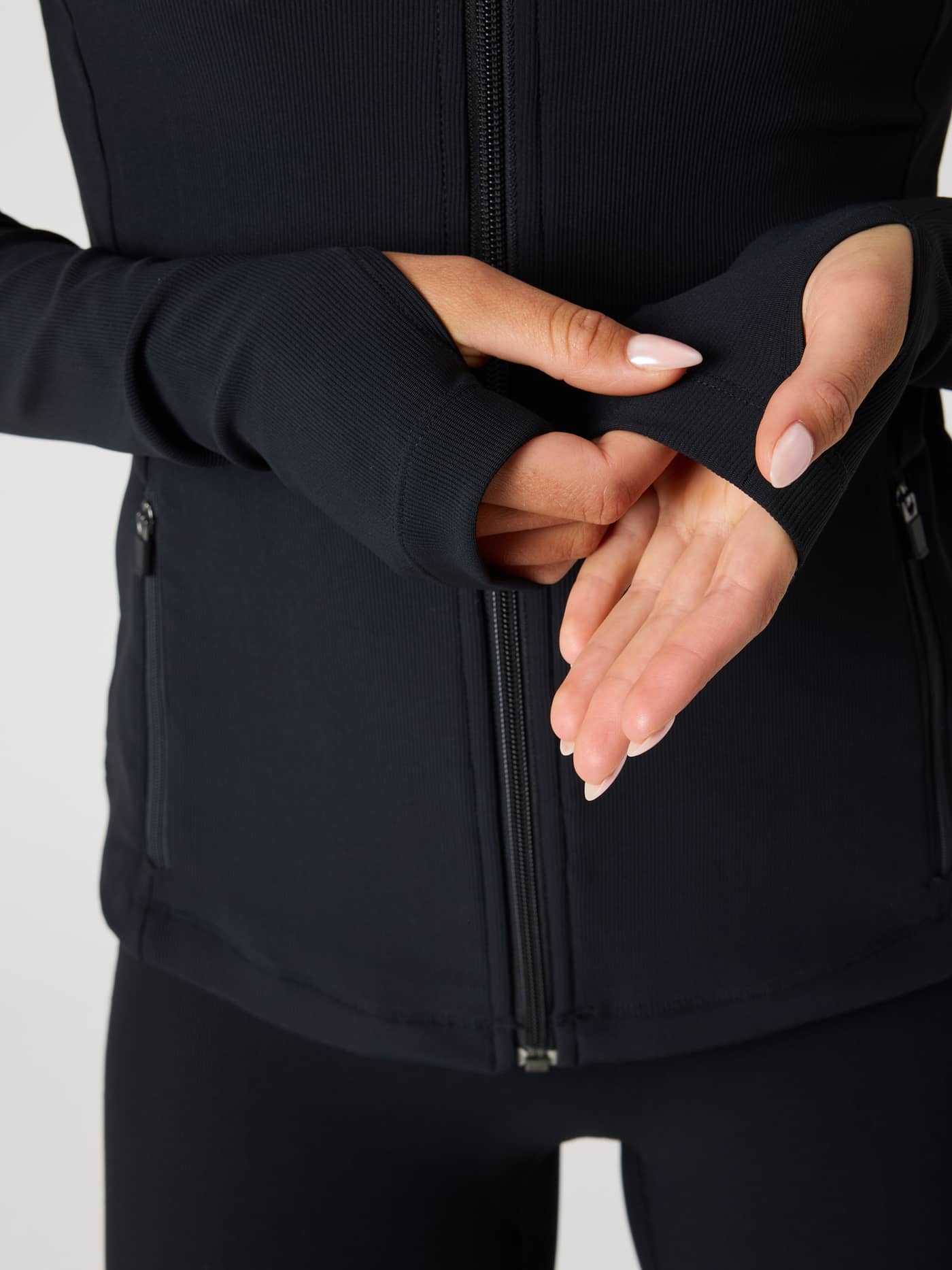 Studio Premium Ribbed Midlayer in Black Beauty (Black) with thumbholes and a stylish ribbed texture for a training fit. - Image 5