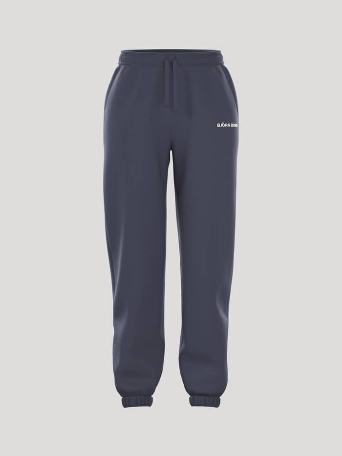 Vooraanzicht van de Borg Essential 4 Sweatpants in Odyssey Gray (Marineblauw) van french terry met losse pasvorm en wit logo.
