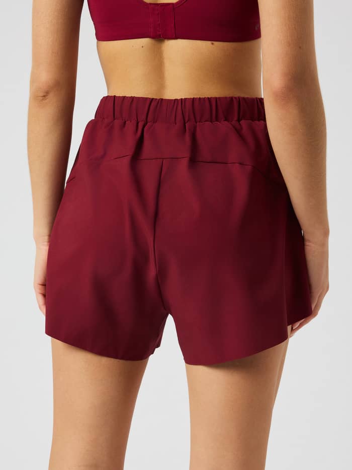 Back view of the Ace 2 In 1 Shorts in Cabernet (Red).