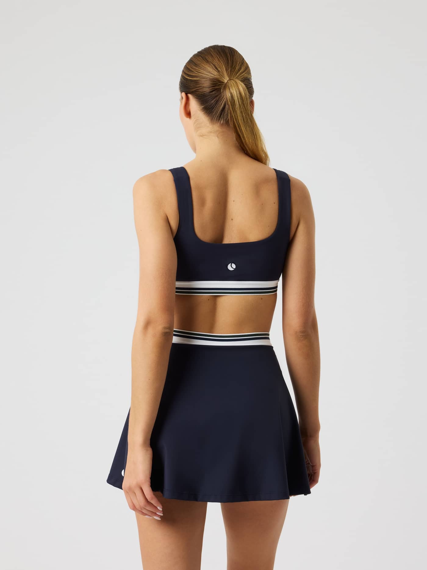Back view of the fitted Björn Borg Ace Court Top in Night sky (Navy), featuring a white logo for tennis performance. - Image 2