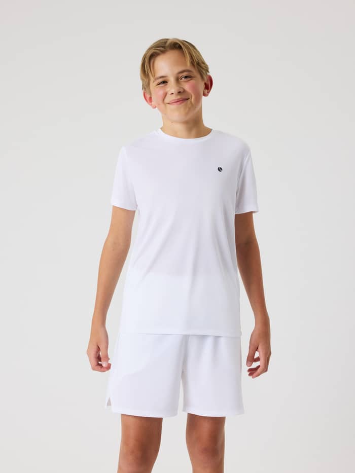 Ace Light T-Shirt i Brilliant White (Hvid) til kids set forfra i et let materiale til tennis og træning. - Image 2