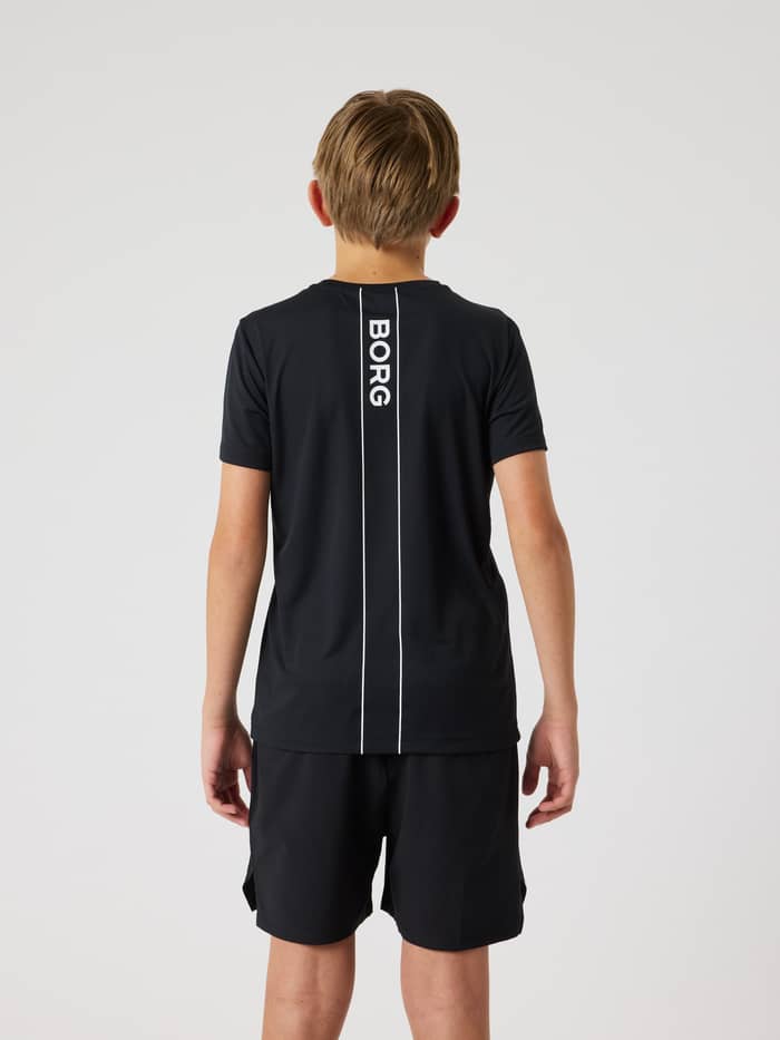 Ace Light T-Shirt til kids i Black Beauty (Sort) set bagfra med et hvidt vertikalt Borg-logo til tennis. - Image 2