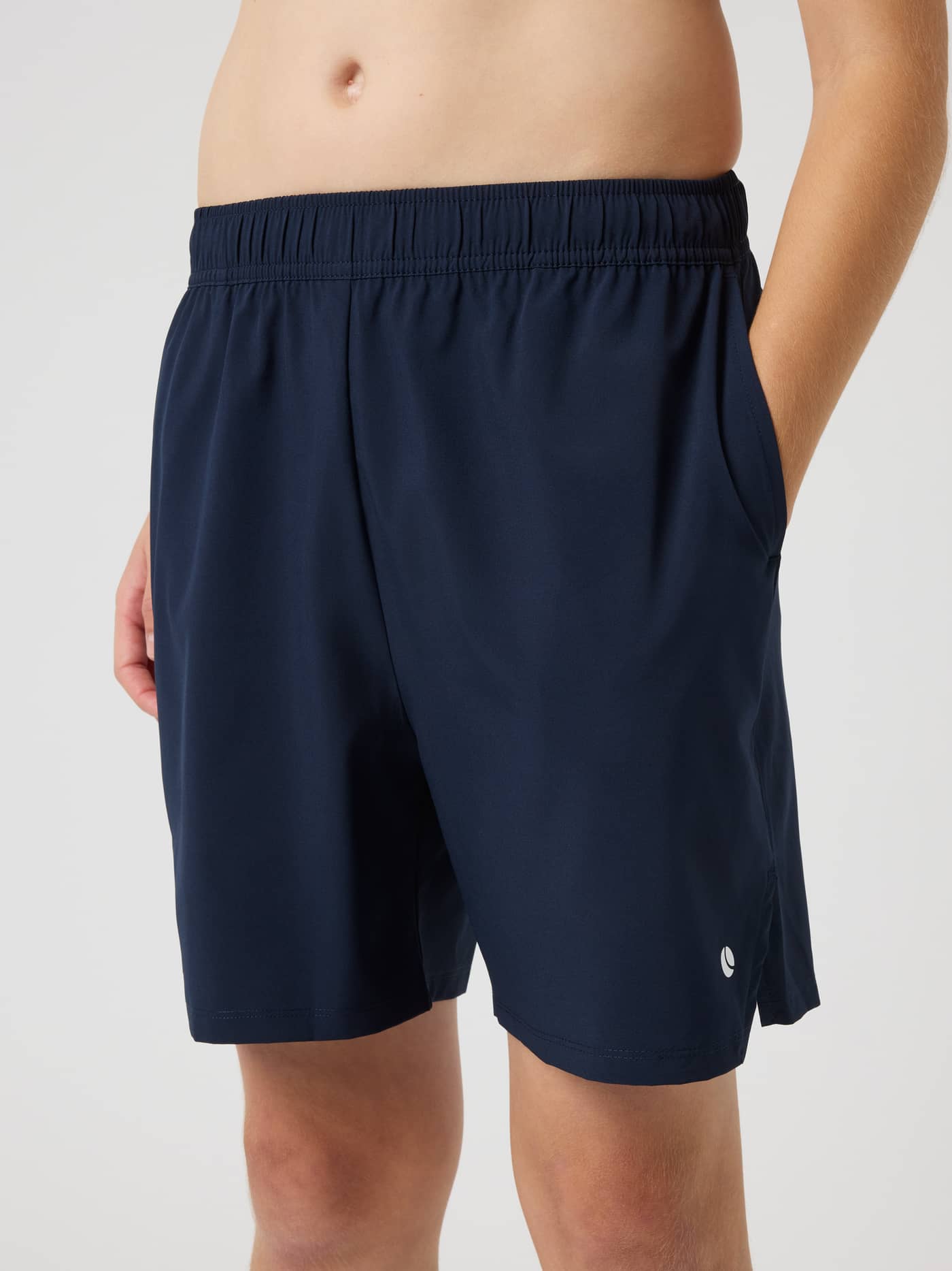 Ace Racquet Shorts in Night sky (Navy) for kids, featuring side pockets and a flexible fit for tennis and active play. - Image 2