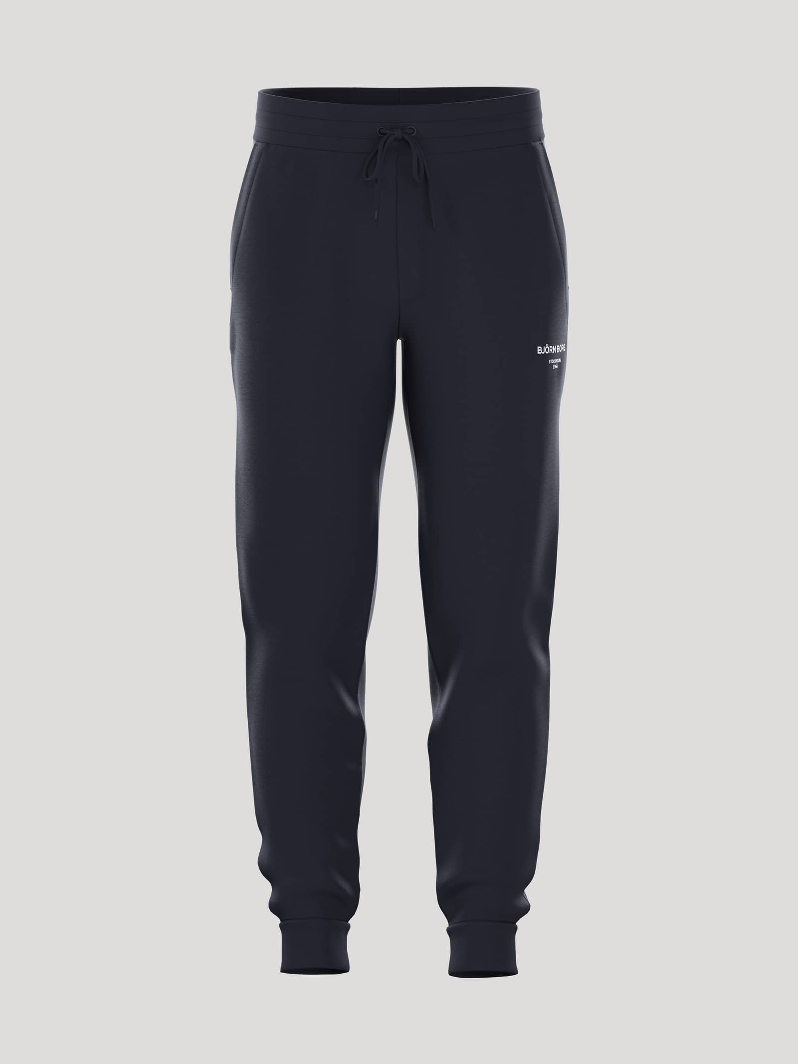 Borg Essential 1 Tapered Sweatpants i Night sky (Marineblå) set forfra med hvidt logo og en stilfuld pasform til tennis. - Image 1