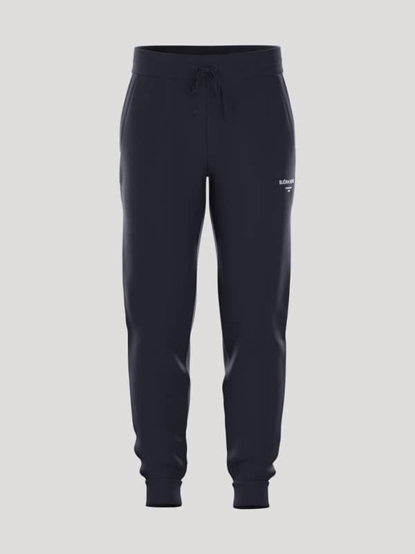 Front view of men's Borg Essential 1 Tapered Sweatpants in Night sky (Navy) with a stylish, functional, tennis-inspired fit.