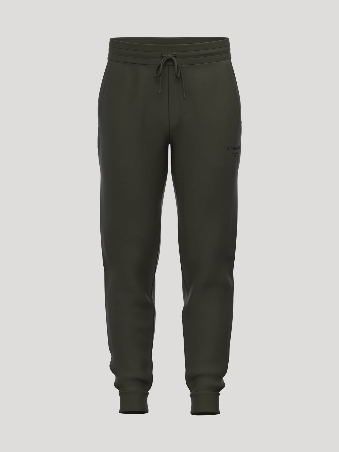 Vue de face du Borg Essential 1 Tapered Sweatpants en Rosin (Vert), pantalon de jogging fuselé au style tennis. - Image 1