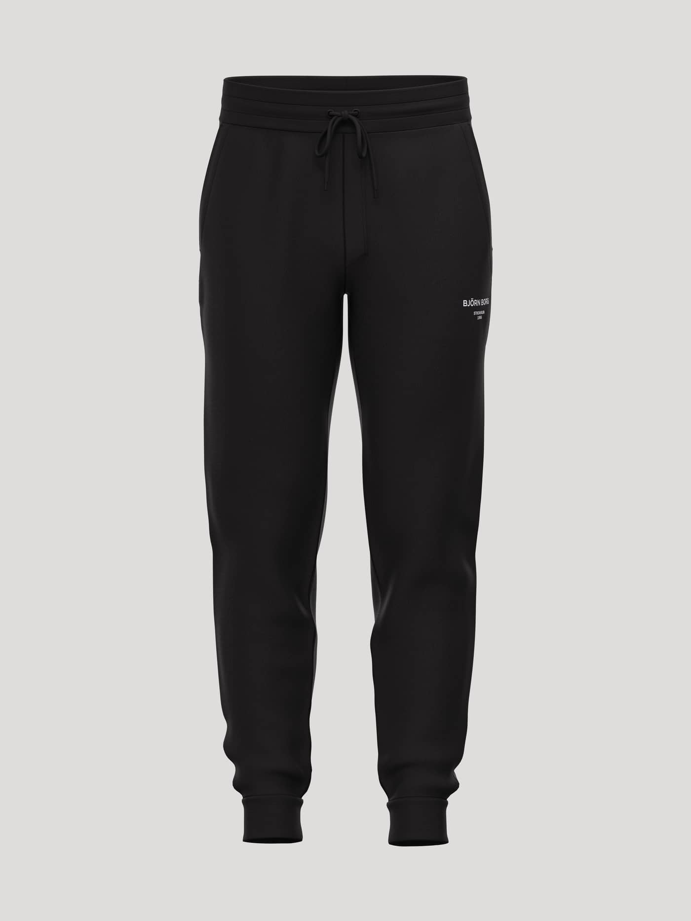 Front view of Borg Essential 1 Tapered Sweatpants in Black Beauty (Black) featuring a white logo and ribbed cuffs. - Image 1